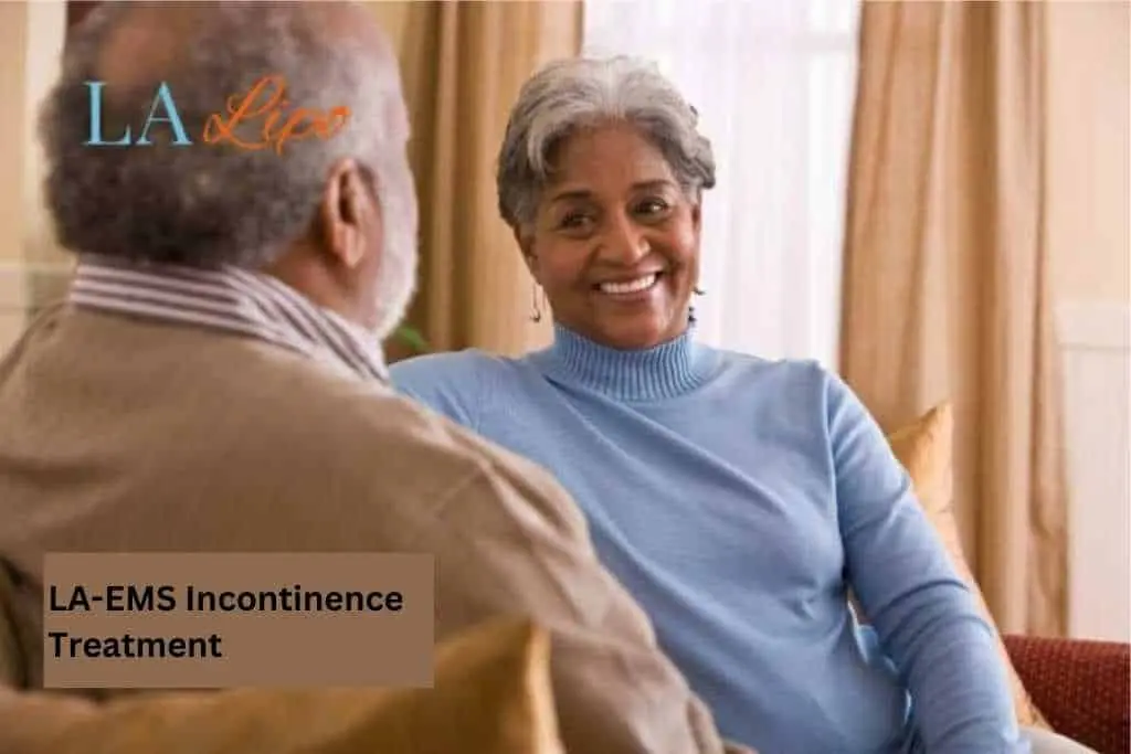 Couple sat smiling at each other - LA-EMS treatment Sandy