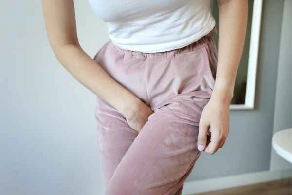 woman struggling with urine incontinence Sandy